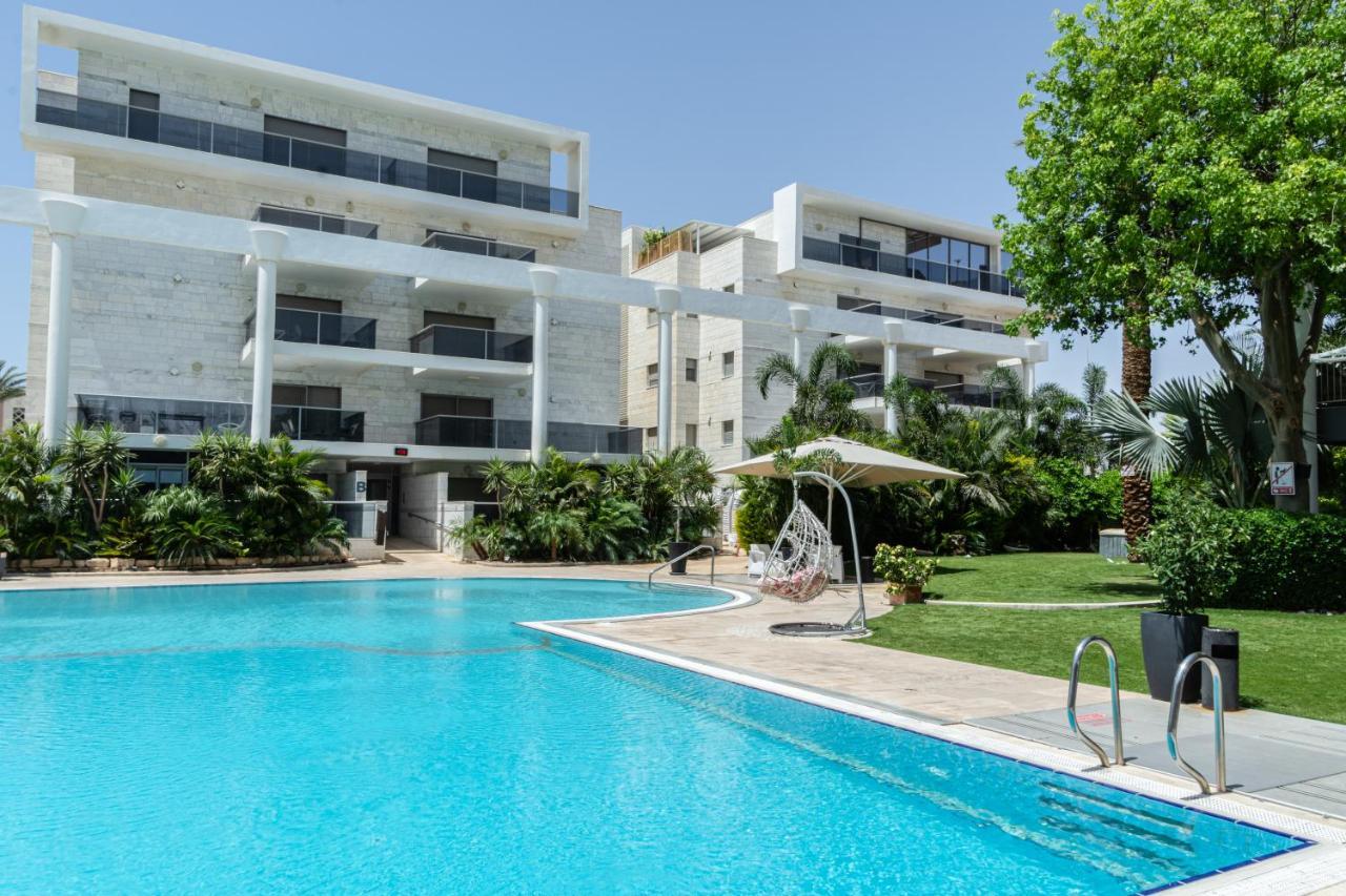 דירת גן פונה לבריכה - Pool Garden View Eilatアパートメント エクステリア 写真