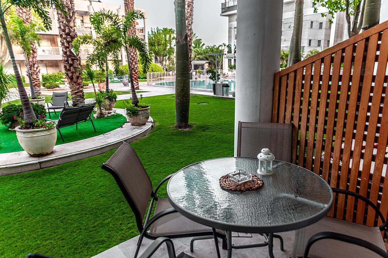 דירת גן פונה לבריכה - Pool Garden View Eilatアパートメント エクステリア 写真