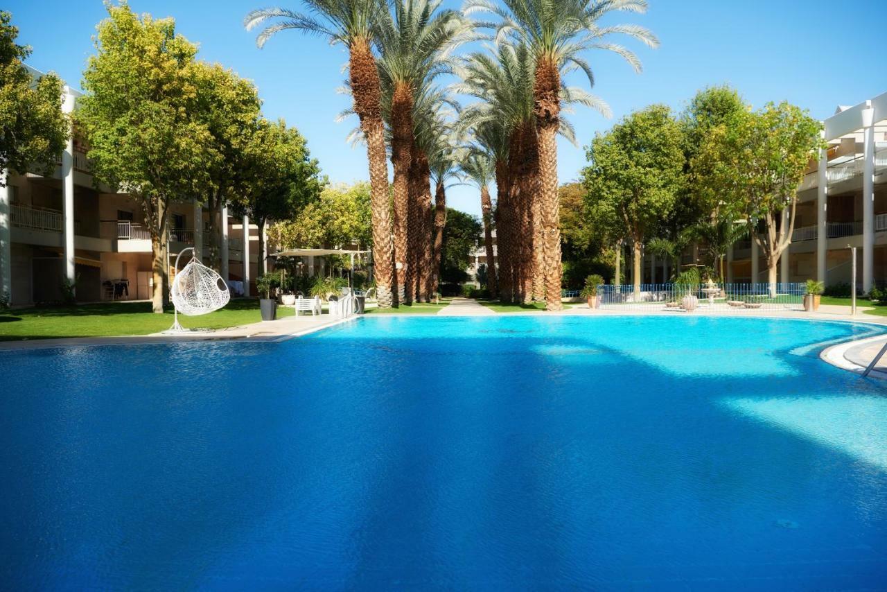דירת גן פונה לבריכה - Pool Garden View Eilatアパートメント エクステリア 写真
